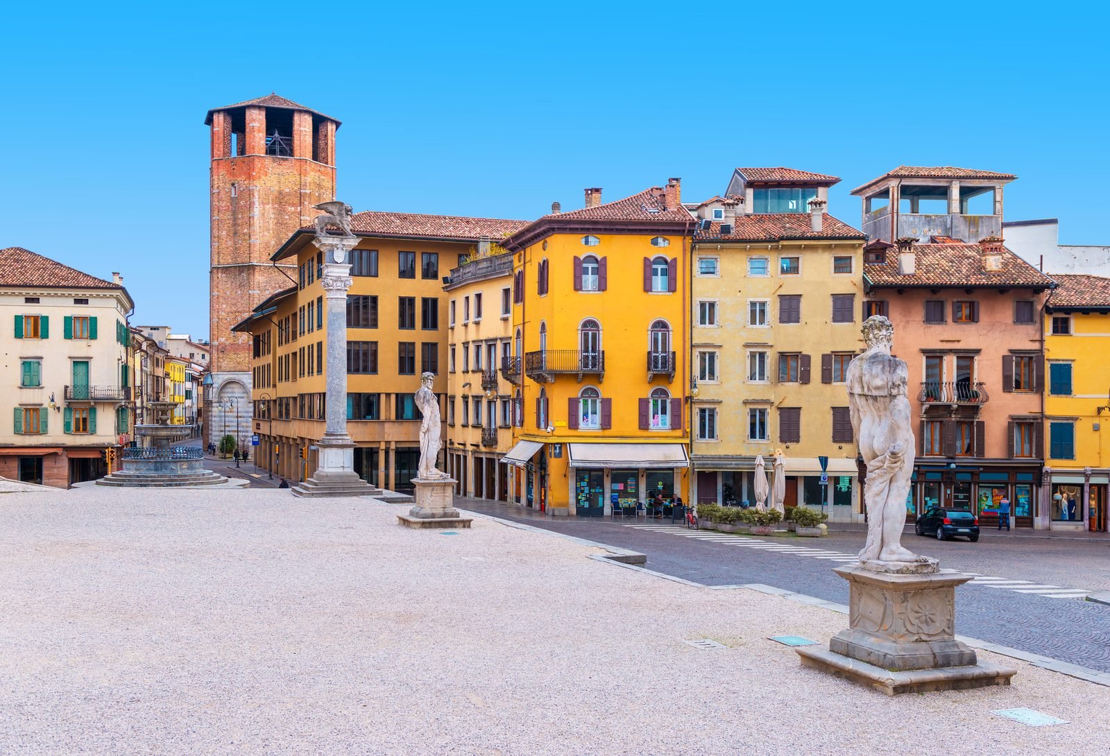 Piazza Libertà, Udine — the colourful main square with its Venetian statues and tower